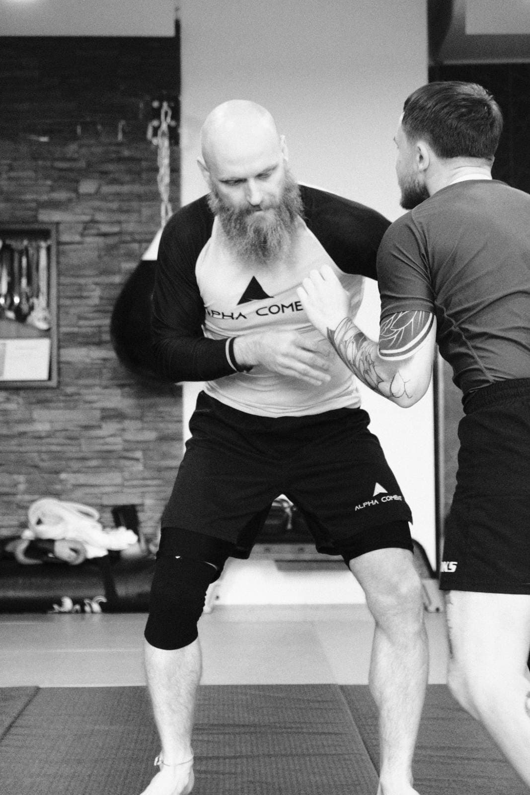 Instructor Yevhenii Nadtochii teaching live grip fighting in Campolide, Lisbon
